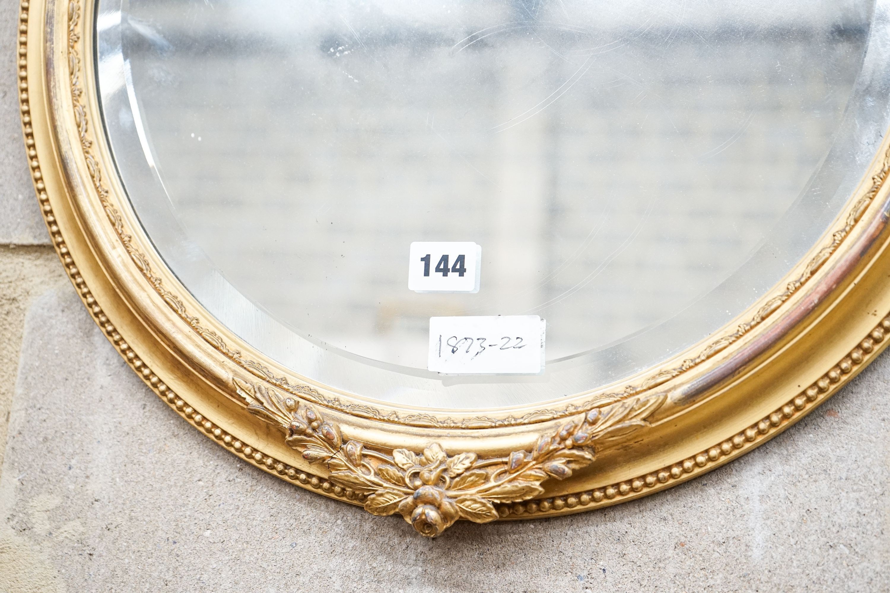 A Victorian circular gilt gesso wall mirror, diameter 48cm